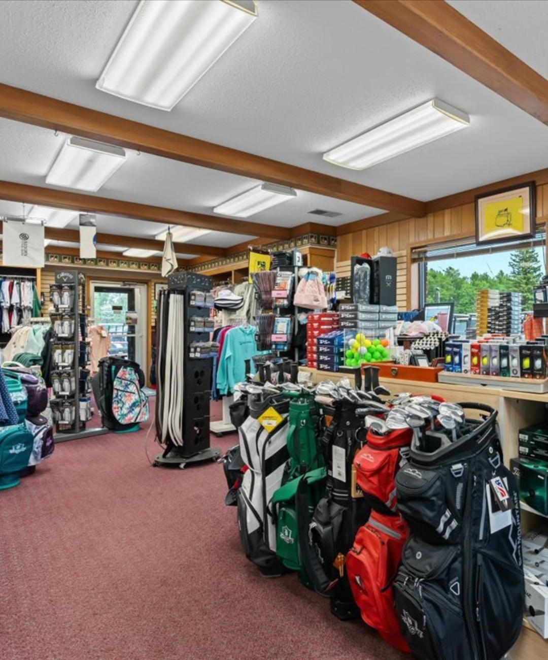 Davison Country Club pro shop with golf bags, apparel, and accessories.