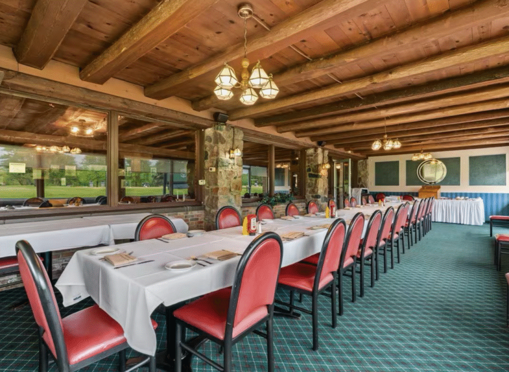 Private dining room set for a corporate event at Davison Country Club