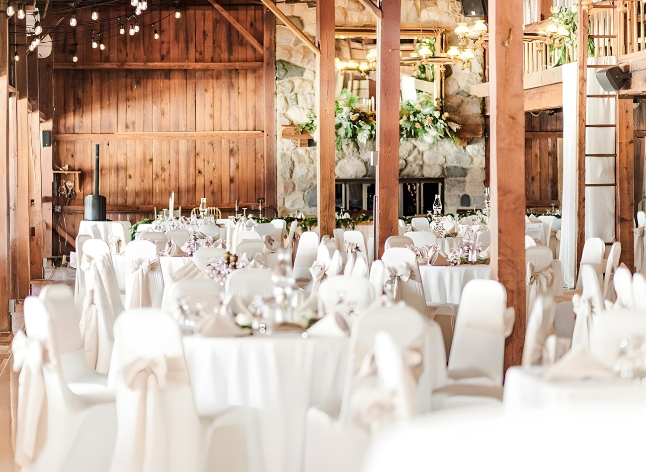 Elegant event setup at Davison Country Club with floral centerpieces and white linens