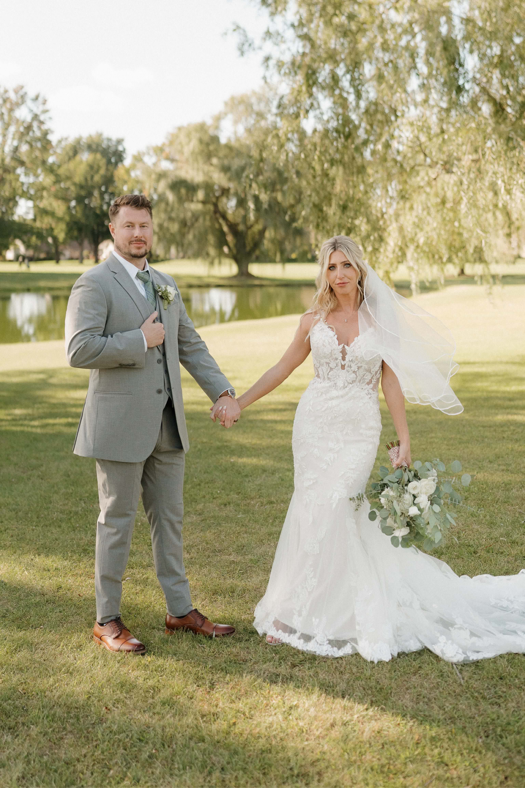Bride and groom outside Davison Country Club after their wedding ceremony