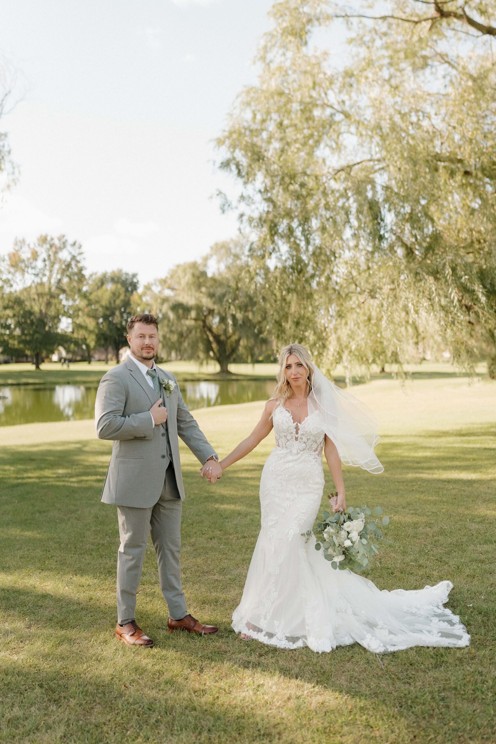 Bride and groom outside Davison Country Club after their wedding ceremony